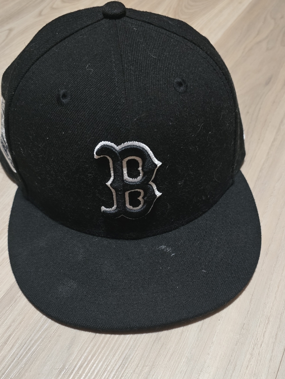 New Era Black Baseball Cap with White 'B' Logo
